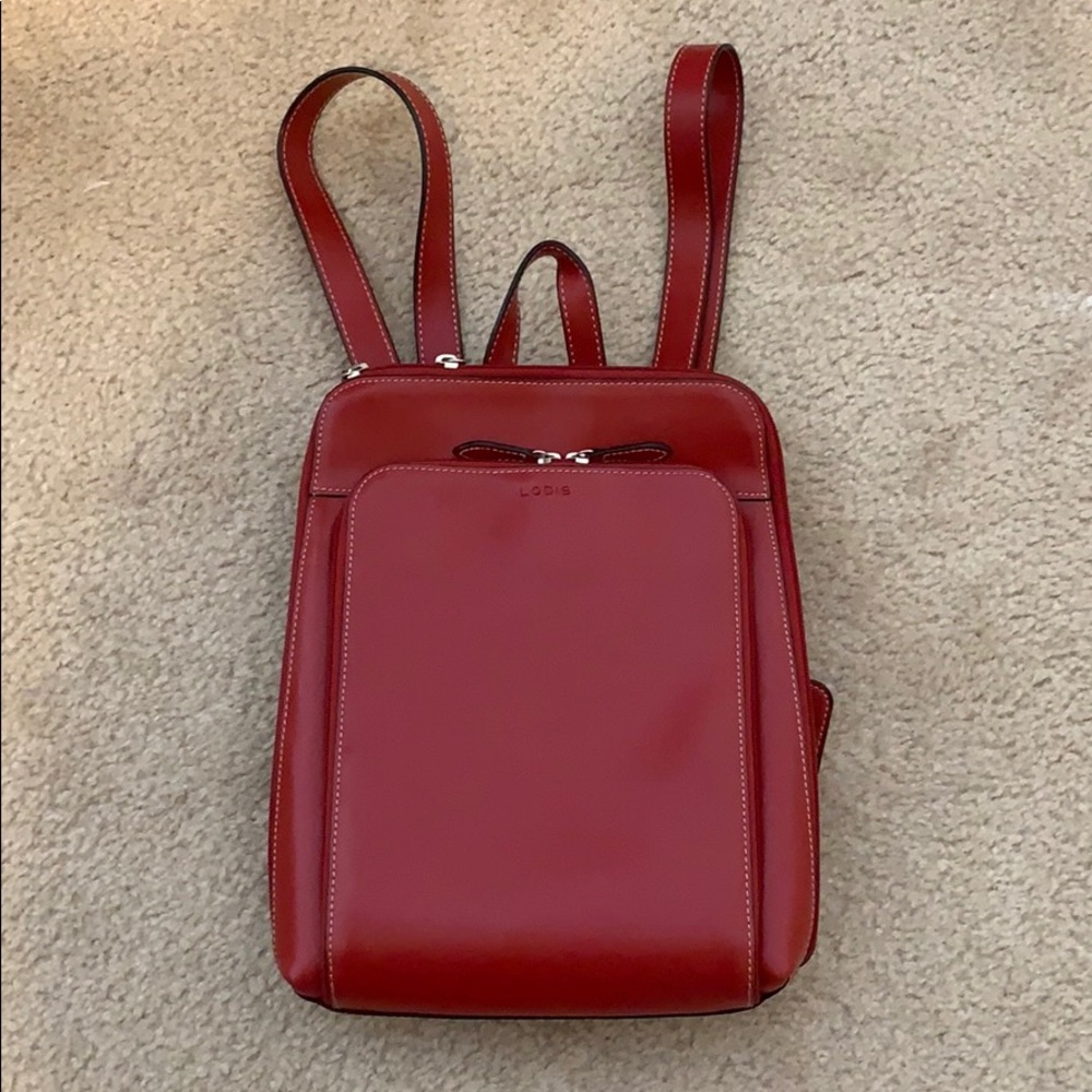 Pristine red leather backpack purse